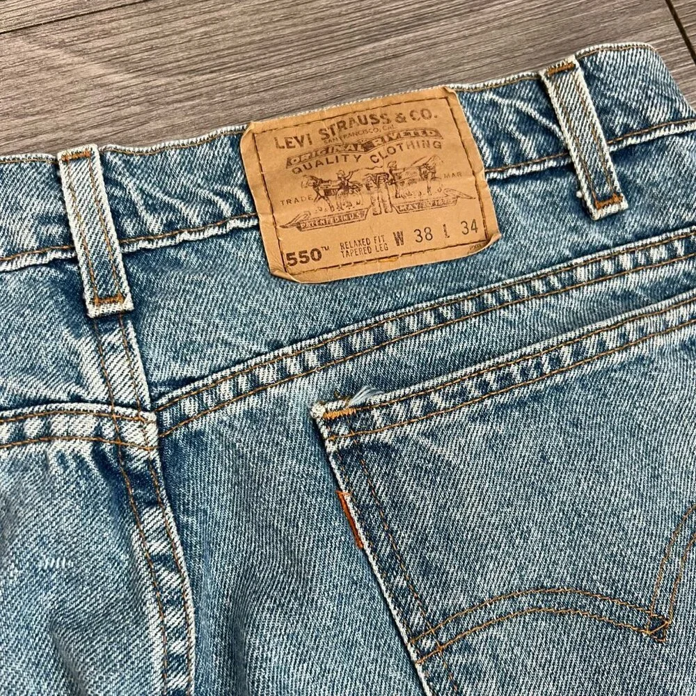 90s Levi’s 550s Relaxed Fit Tapered Leg Orange Tab Light Wash Jeans Sz 38X34